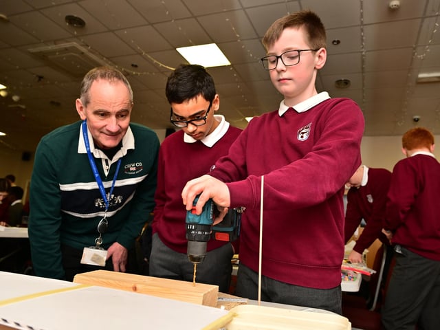 Tony Landray with Graham School students