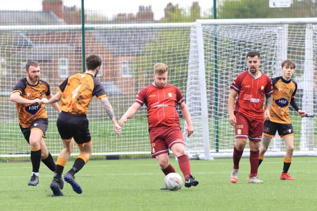 Bridlington Rovers 1903, red kit, push on during their 3-0 home win against AFC Robin in Division 3 of the Right Car East Riding County League.