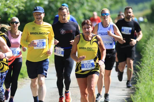 Action from the Top of the Wold 10K. PHOTOS BY TCF PHOTOGRAPHY