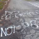 A Local spray painter left a message on Queensgate, Bridlington, that the roads are 'not good' and the council needs to 'do a proper job'.