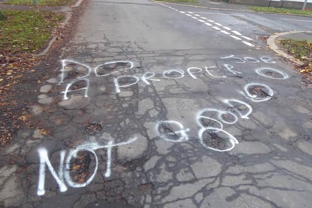 A Local spray painter left a message on Queensgate, Bridlington, that the roads are 'not good' and the council needs to 'do a proper job'.