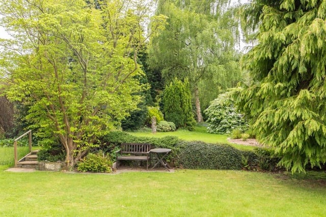 Leafy, private gardens are tiered and colourful.