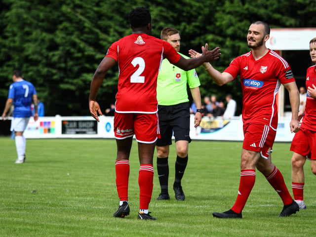Two-goal hero Kieran Weledji is congratulated by teammate Frank Mulhern after one of his goals in the win against Marske.