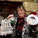 Setting up for Whitby's Christmas Festival ... Jane Kinroy and Karen Neeson of Yorkshire Fused Glass.
picture: Richard Ponter