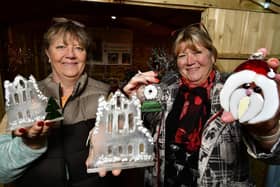 Setting up for Whitby's Christmas Festival ... Jane Kinroy and Karen Neeson of Yorkshire Fused Glass.
picture: Richard Ponter