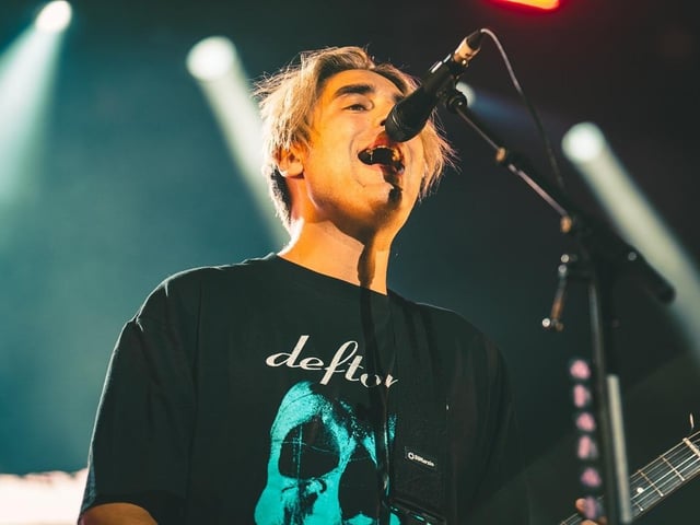 Busted's Charlie on stage.