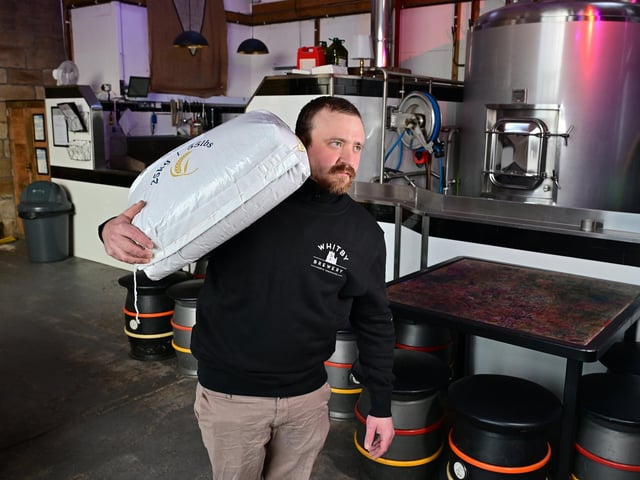 Max Jackson working in the brewery.