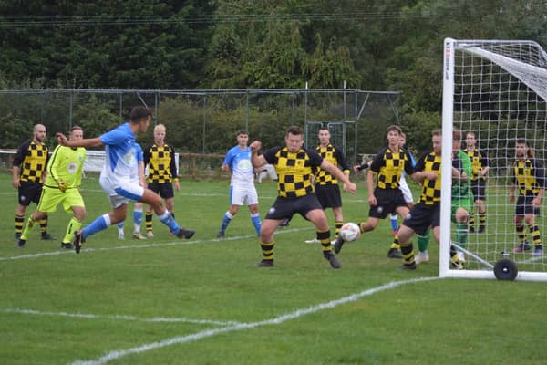 Ethan Chan volleys home Heslerton's late equaliser at Sand Lane on Saturday forcing a penalty shootout which Rosedale would eventually win and progress to the next round of The Scarborough Junior Cup.