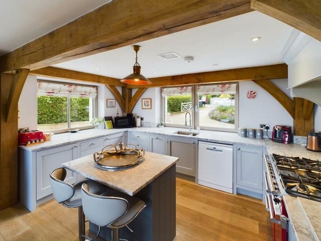 The beamed and double aspect breakfast kitchen.