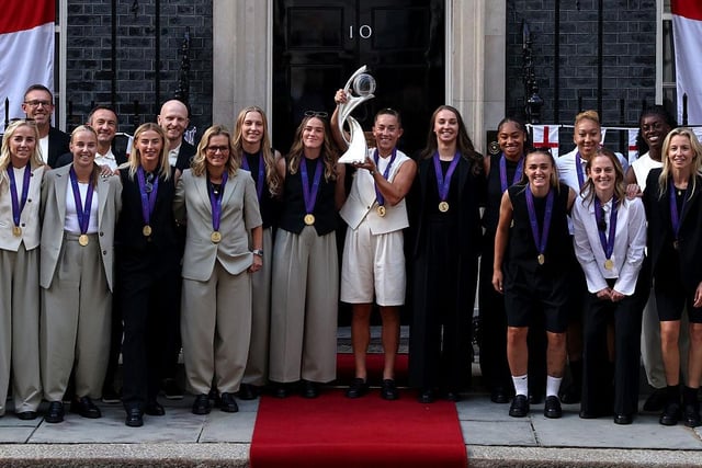 The England squad wearing their winners' medals arrive in Downing Street for a reception at No 10, hosted by Deputy Prime Minister Angela Rayner, with Beth Mead front row second left. Photo by Dan Kitwood/Getty Images.