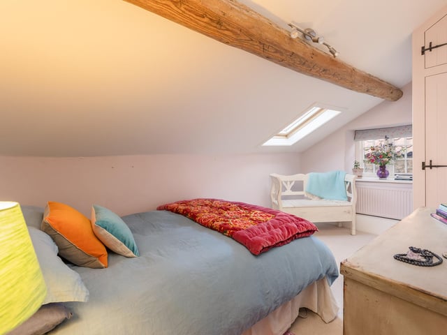 Another traditional style cottage bedroom.
