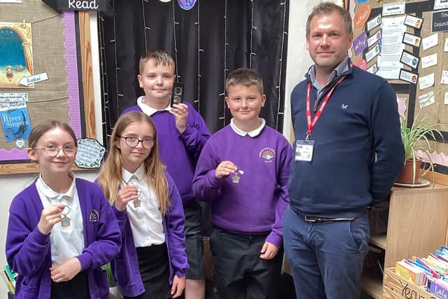 Hawsker-cum-Stainsacre School pupils with Matt Gibson of Wharfedale Homes.