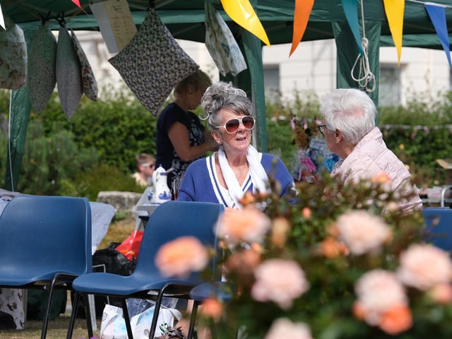 People chatting at Filey in Bloom.
223032e