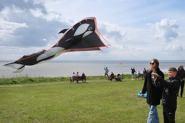 Mum Jade, with son Sam Kelly, have a go at soaring.