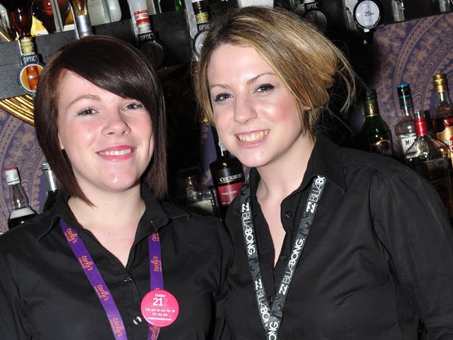 Sammi and Holly serve the drinks in The Barbican.
