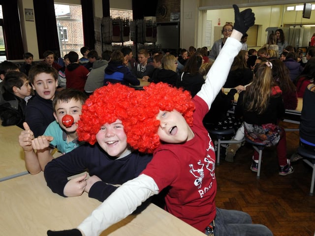Norton College pupils Jack Smith and Tom Wainwright looking forward to the Harlem shake dance for Red Nose Day, led by Mr Fox, right. 131157d, Photo by Andrew Higgins