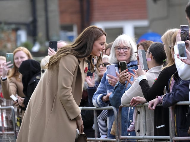 The crowd capture images of the Princess