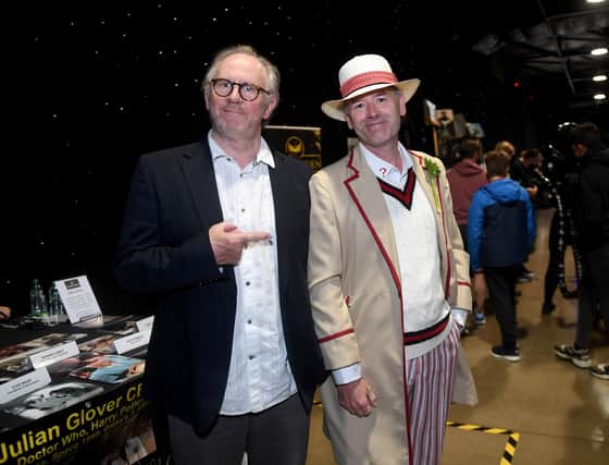 Comic Con at the New Dock Hall, Royal Armouries, Leeds. Real life Doctor Who Peter Davison meets John Osborne dressed as the Character