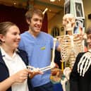 NSHS staff Isla Rammage and Robert Clarkson chat to a student at the 2023 event