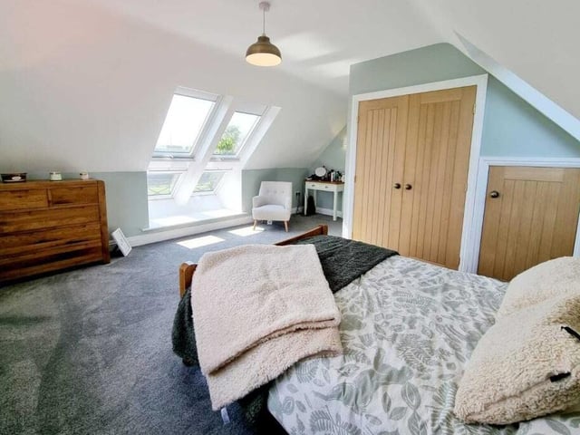 Another spacious bedroom, with Velux windows.