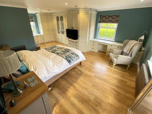 A stunning triple aspect bedroom.
