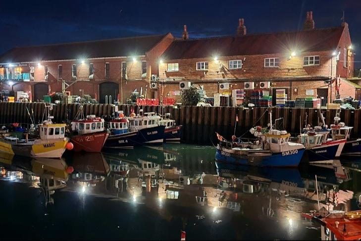 Lights on a shining Scarborough harbour.
picture by Christine Shears