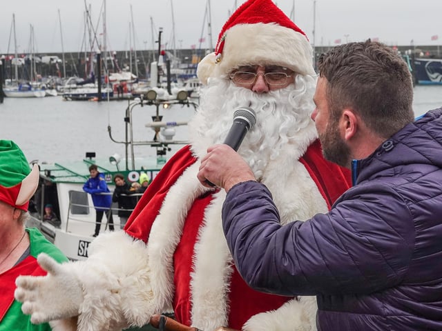 Santa was met by team members of This Is The Coast radio station.