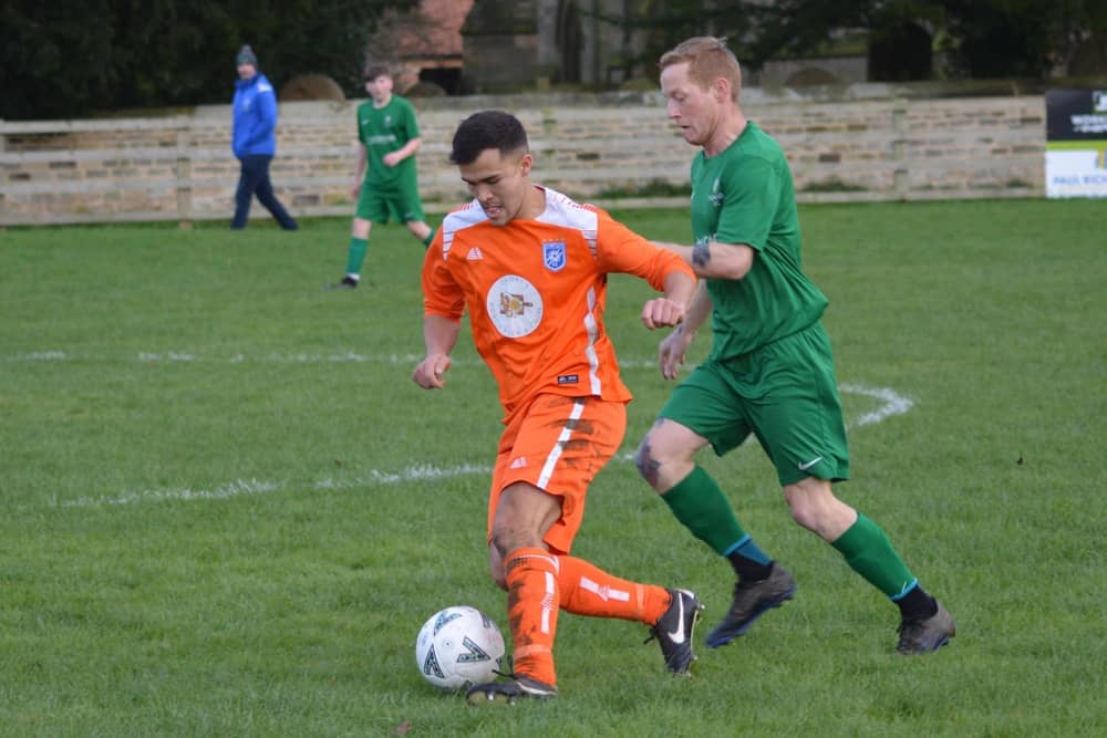 Heslerton midfielder Ethan Chan was man of the match at Slingsby