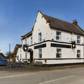 The exterior of the village pub that is due to go up for auction this month.