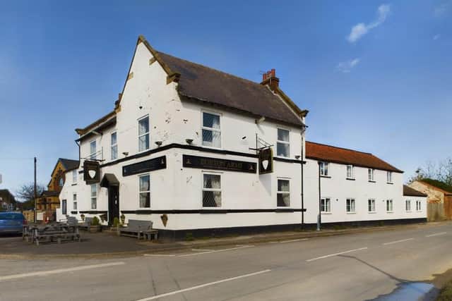 The exterior of the village pub that is due to go up for auction this month.