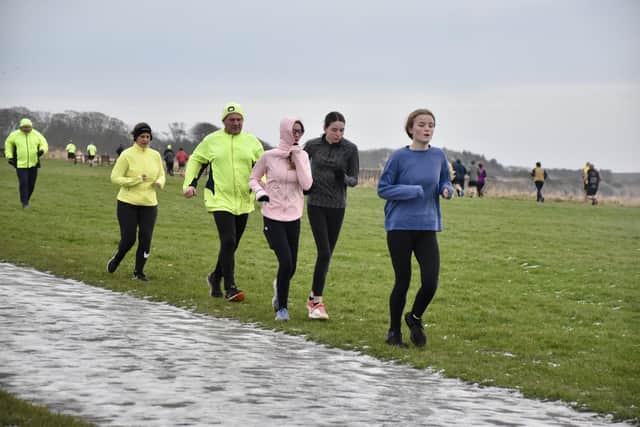 Runners brave the wintry weather at Sewerby last weekend. PHOTOS BY TCF PHOTOGRAPHY