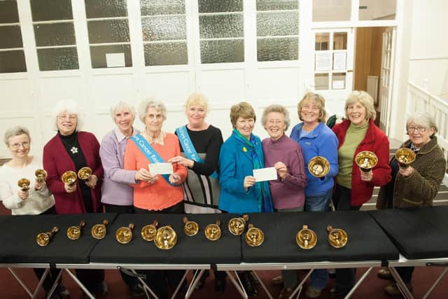 A cheque presentation by Bridlington Handbell Ringers in 2015.