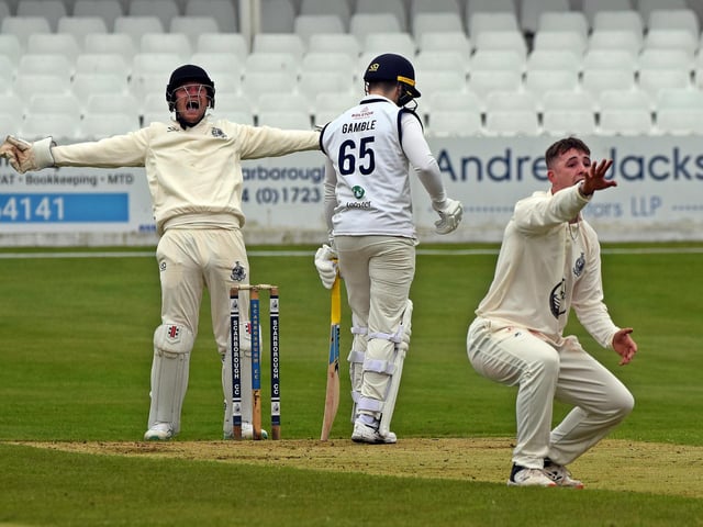 Skipper Ben Gill and Jack Redshaw appeal for lbw