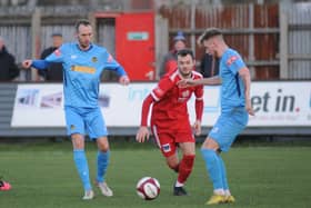 Lewis Dennis, centre, was on target in the last game for the Seasiders against Long Eaton United earlier this season.
