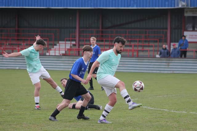 Tris Mustoe gets the ball under control for Edgehill.