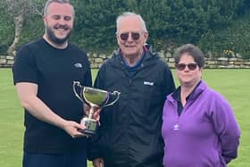 The trophy was presented by the competition sponsor, David Hill of North Cliff to winners Adam Chilvers and Lisa Watson
