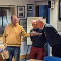 Colin and Mike blowing out their 80th candles together - Image: RNLI/Nick Gough