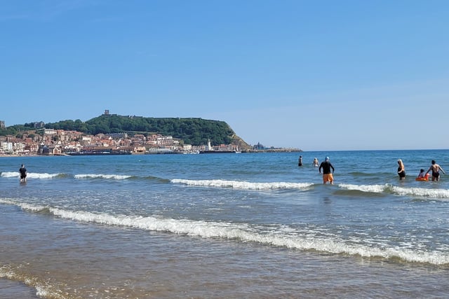 People enjoy paddling in the sea at South Bay, by Coralie McGrath.
