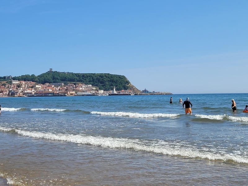 People enjoy paddling in the sea at South Bay, by Coralie McGrath.