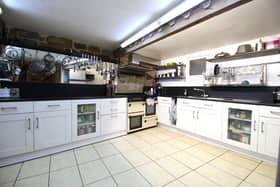 The fitted kitchen with range cooker is in the basement.
