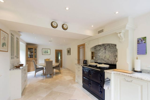 An open-plan kitchen has maintained a style that compliments the period features of the property.