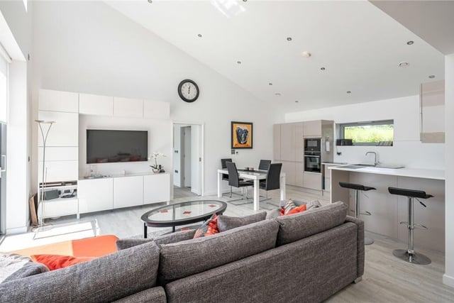 A relaxed seating area adds to the social aspect of the open plan living kitchen.