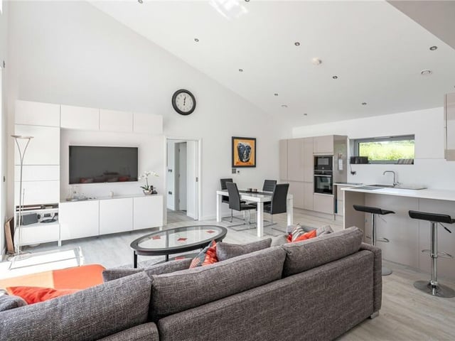 A relaxed seating area adds to the social aspect of the open plan living kitchen.