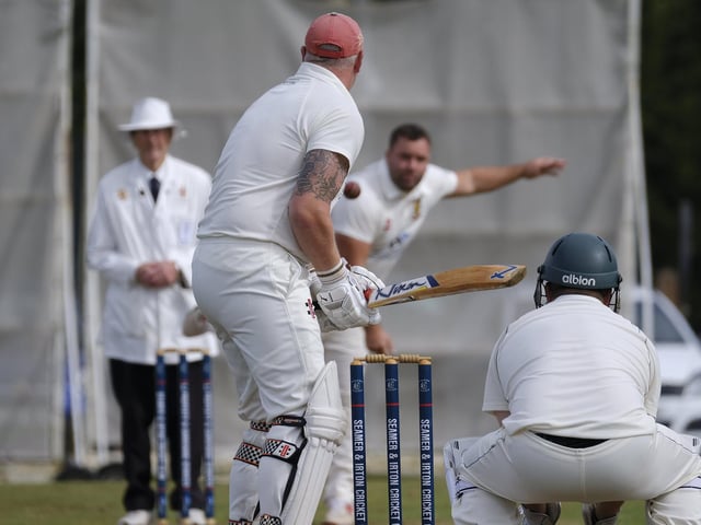 Darrol Lewis, of Seamer, prepares to face a delivery from Flixton 2nds bowler Chris Mann