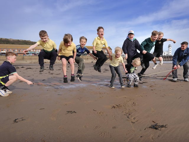 Friends gather on the beach