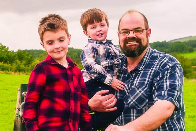 Chris Trousdale, pictured with children Isaac and Peter.