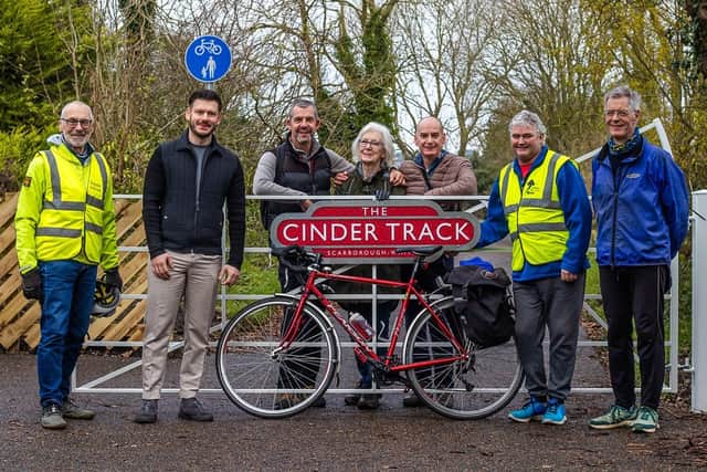 Cllr Keane Duncan (second left), with residents and volunteers from Sustrans on the upgraded Cinder Track. picture: Phoebe Donbavand/Sustrans.