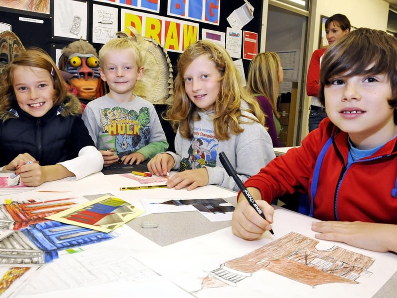 Scalby School youngsters taking part in the Big Draw (from left): Sacha Butterworth,William Butterworth,Olivia Butterworth and Ben Brader hard at work.
104082a