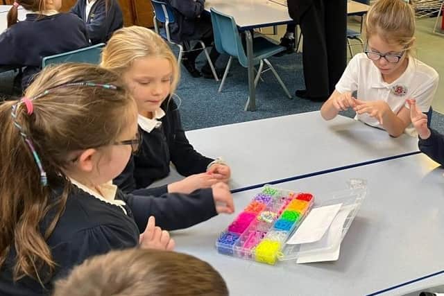East Whitby Academy youngsters having fun at the loom band club.