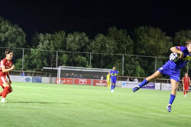 The handball by Garforth Town which saw Brid Town awarded their penalty. Photo by EC Media